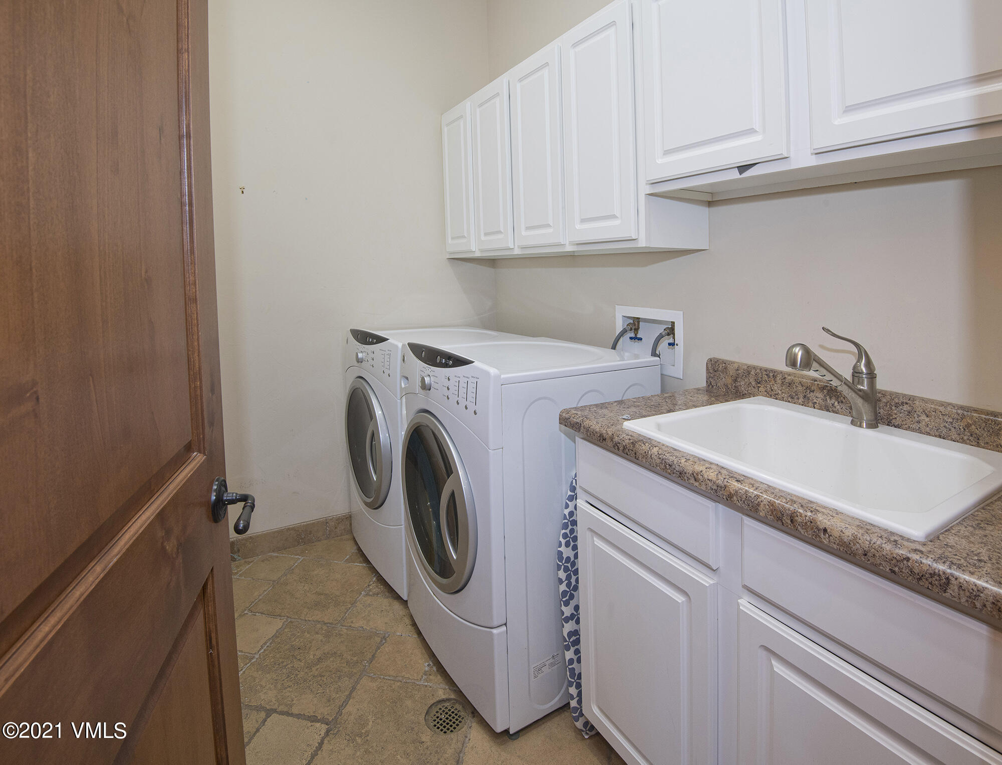 295 Main Street, Unit R201 Edwards, CO 81632 - Photo 22 of 36 a utility room with sink dryer and washer