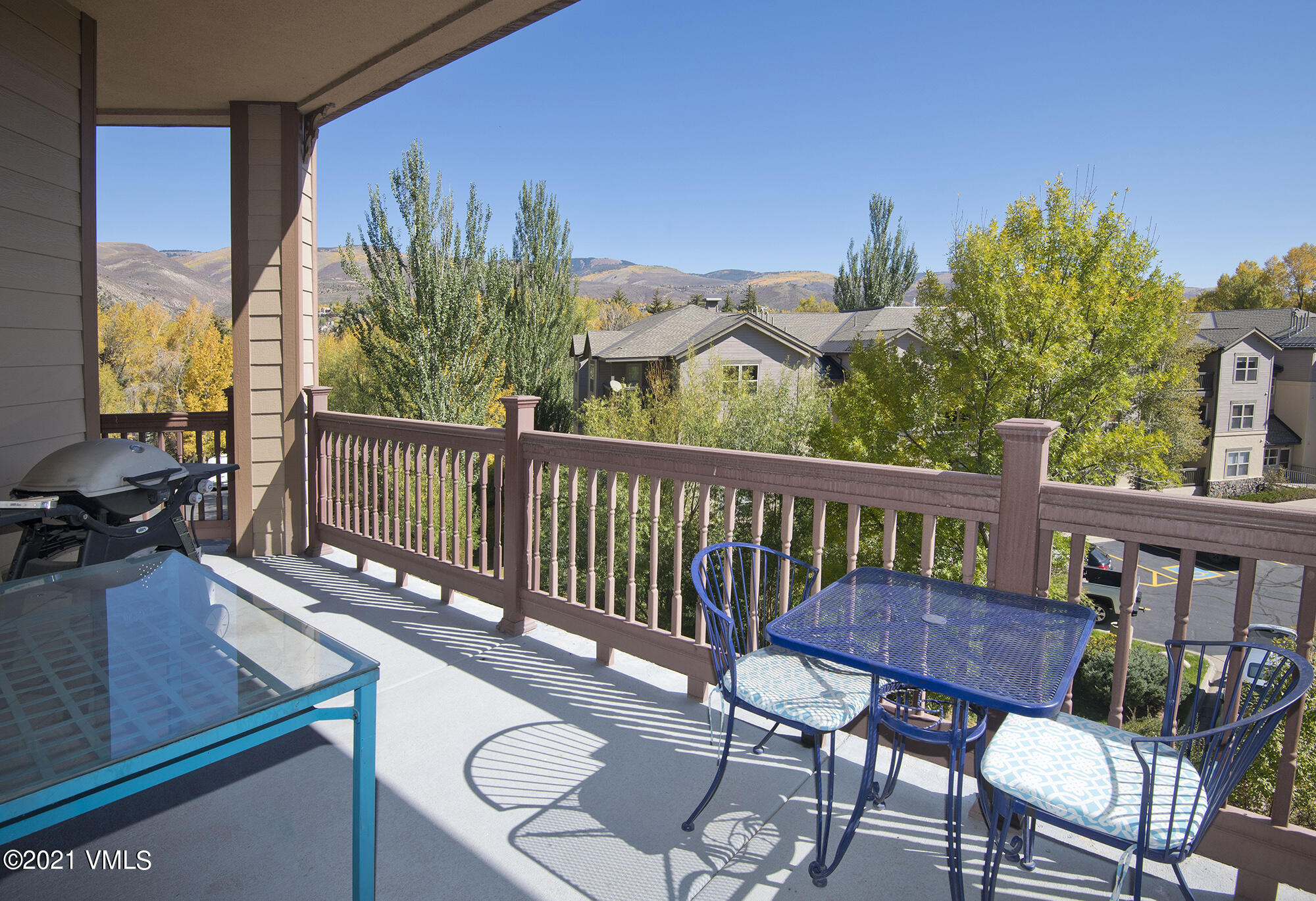 295 Main Street, Unit R201 Edwards, CO 81632 - Photo 23 of 36 a view of a balcony with furniture