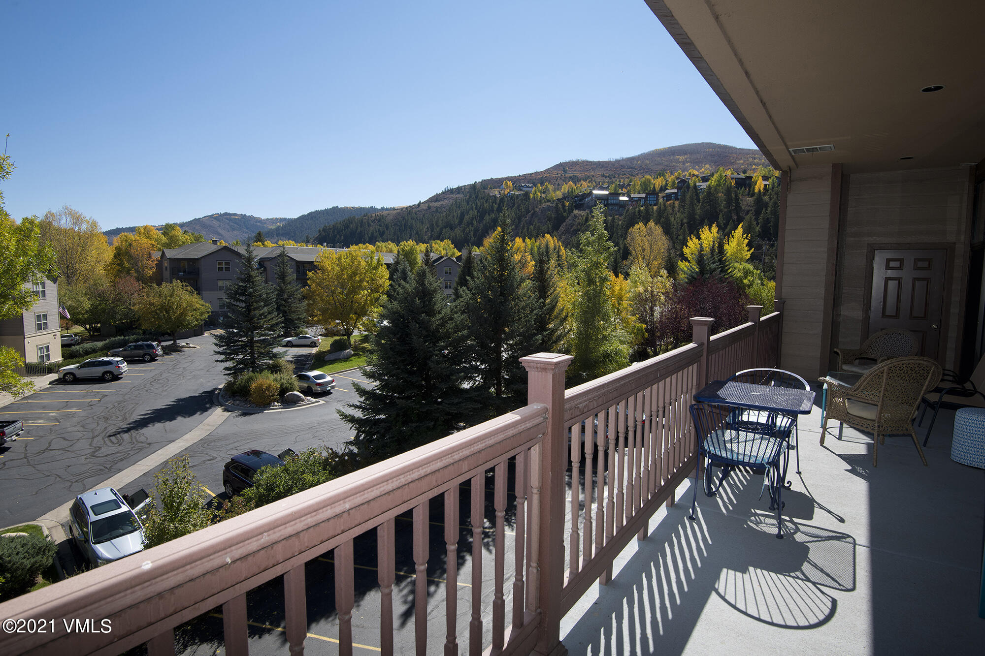 295 Main Street, Unit R201 Edwards, CO 81632 - Photo 25 of 36 a view of a balcony with a yard