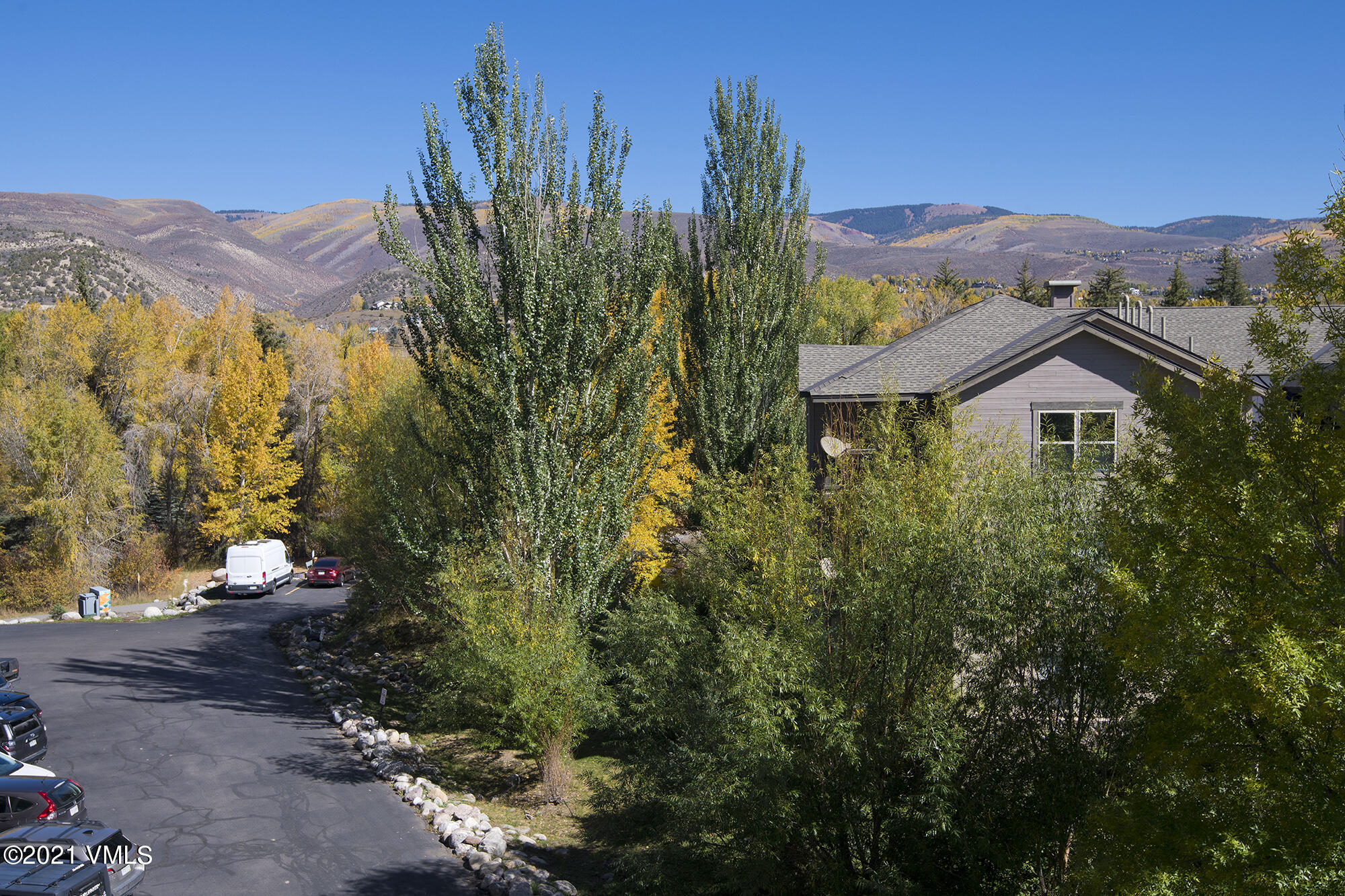 295 Main Street, Unit R201 Edwards, CO 81632 - Photo 26 of 36 a view of a house with a yard
