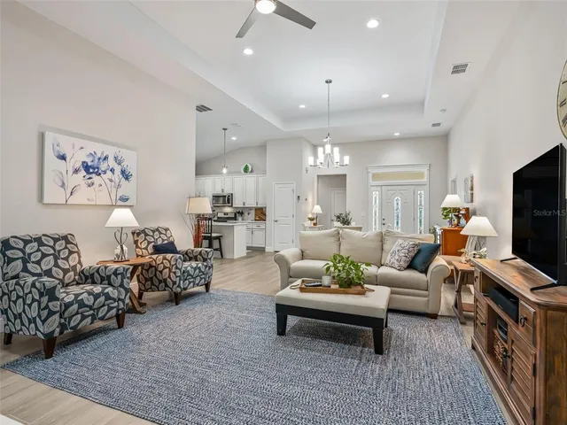 a bedroom with a bed and a night stand