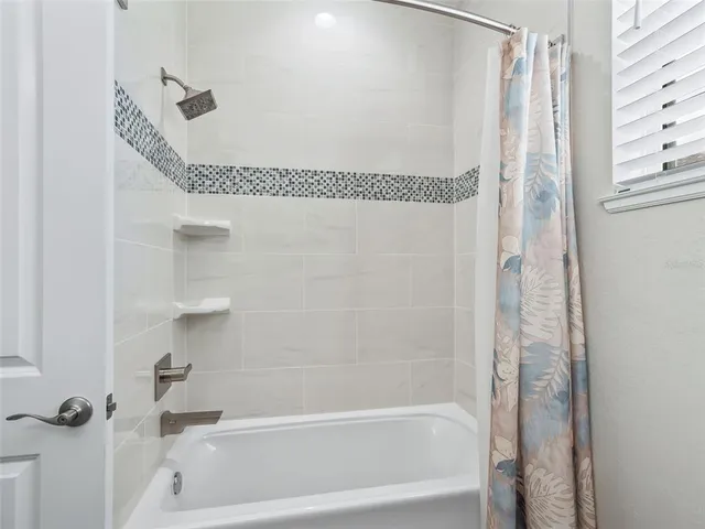 a room with furniture and a window