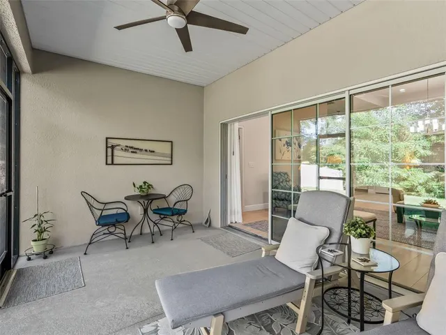 a view of a house with backyard and garden