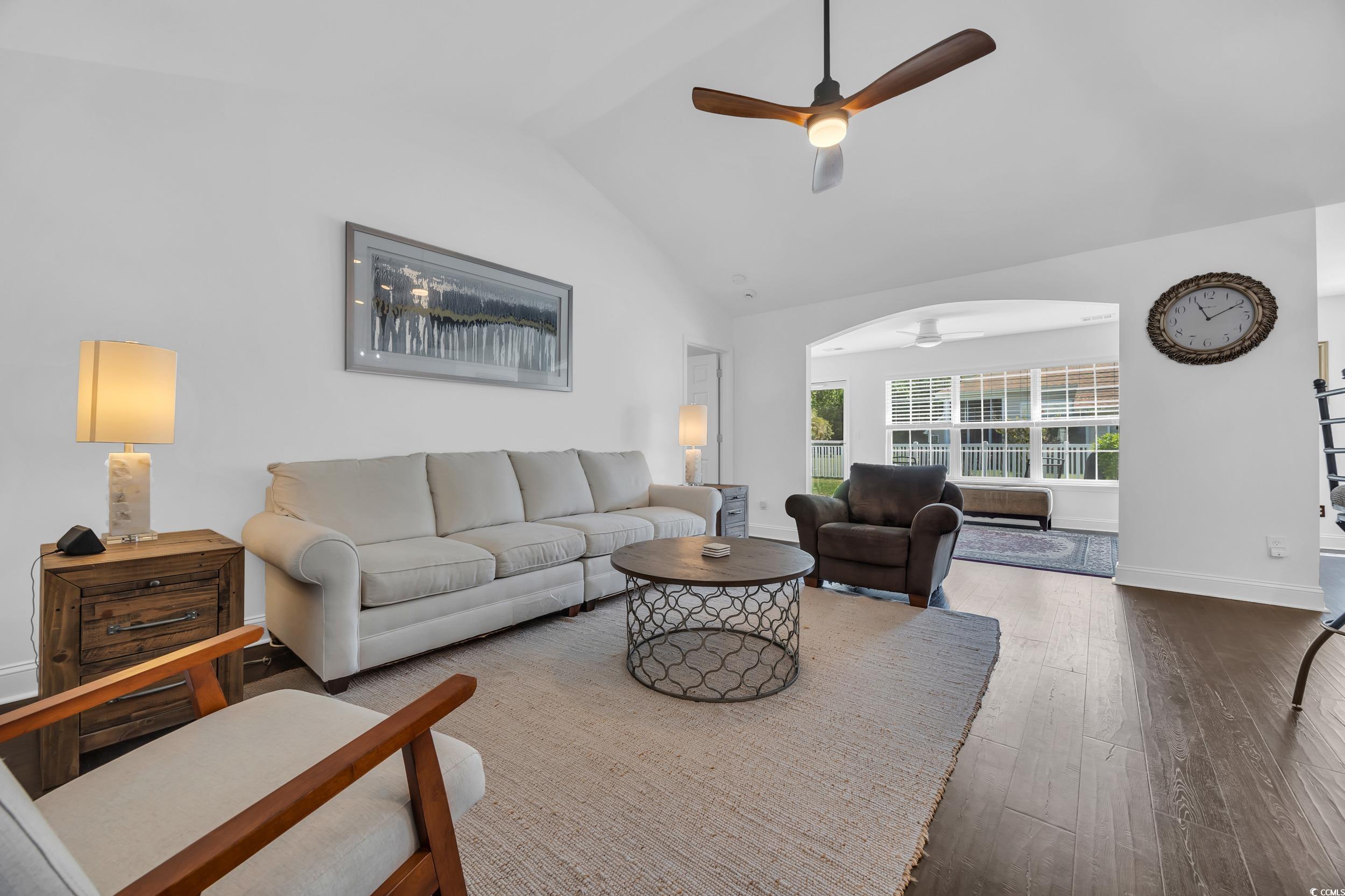 174 Seville Drive Murrells Inlet, SC 29576 - Photo 8 of 40 Living room featuring high vaulted ceiling, arched