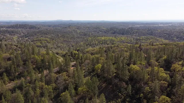 a view of a city with mountain