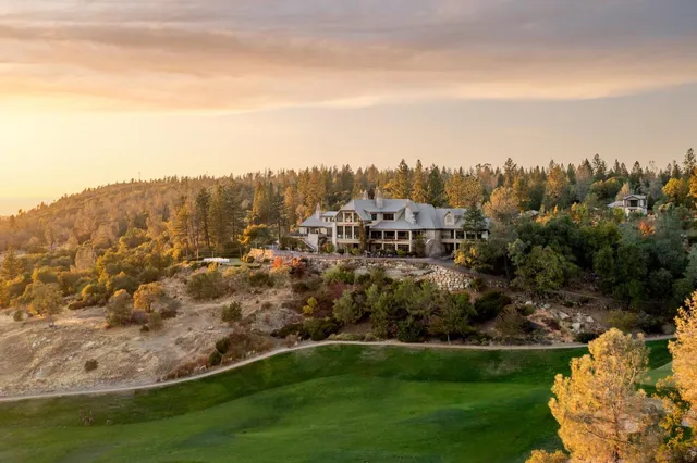 a view of a house with a park