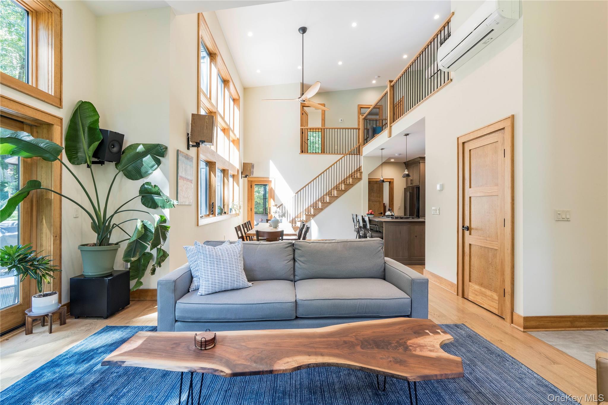 105 Iron Mountain Road Warwick, NY 10990 - Photo 23 of 49 a living room with furniture fireplace and wooden floor