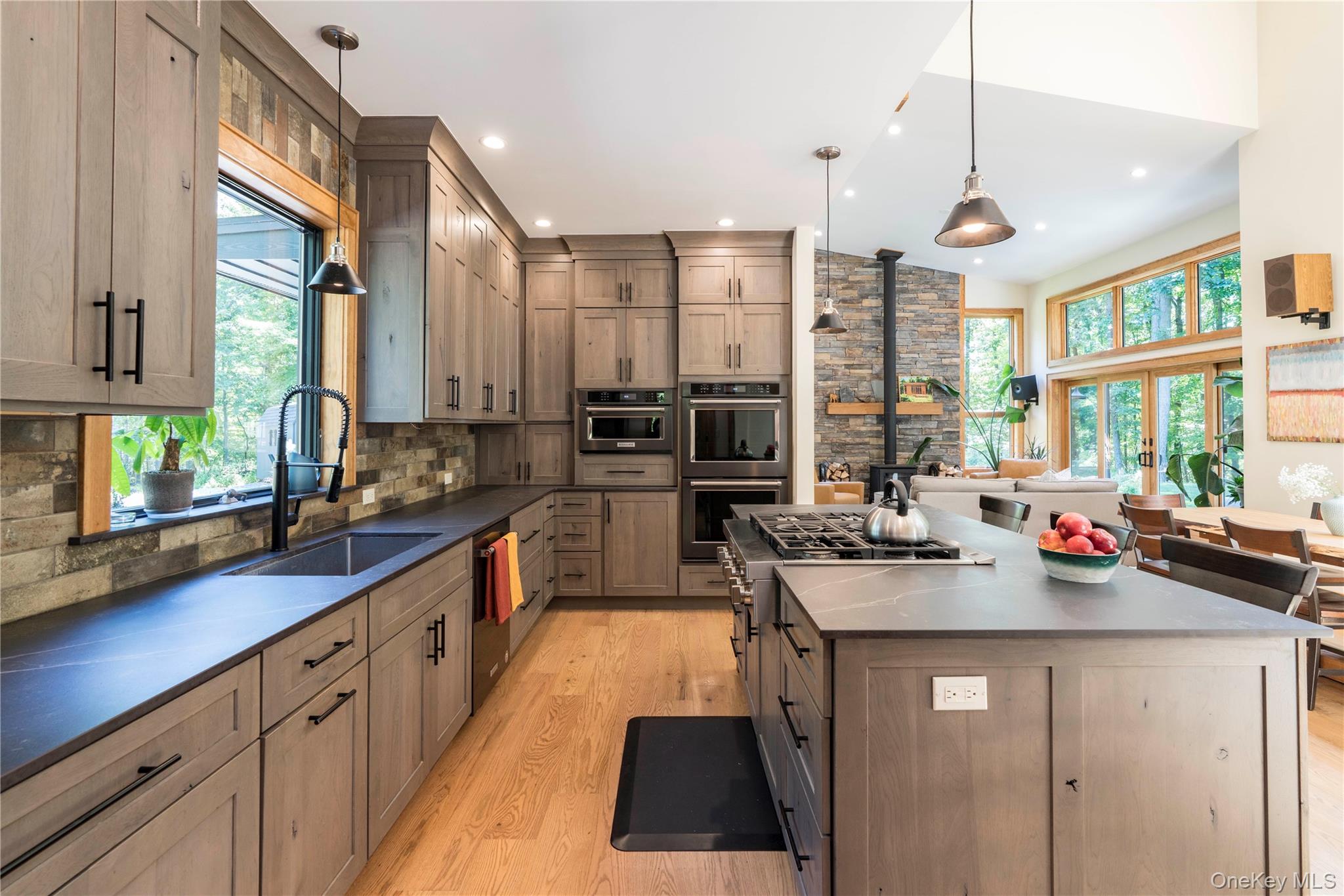 105 Iron Mountain Road Warwick, NY 10990 - Photo 30 of 49 a kitchen with sink stove and cabinets