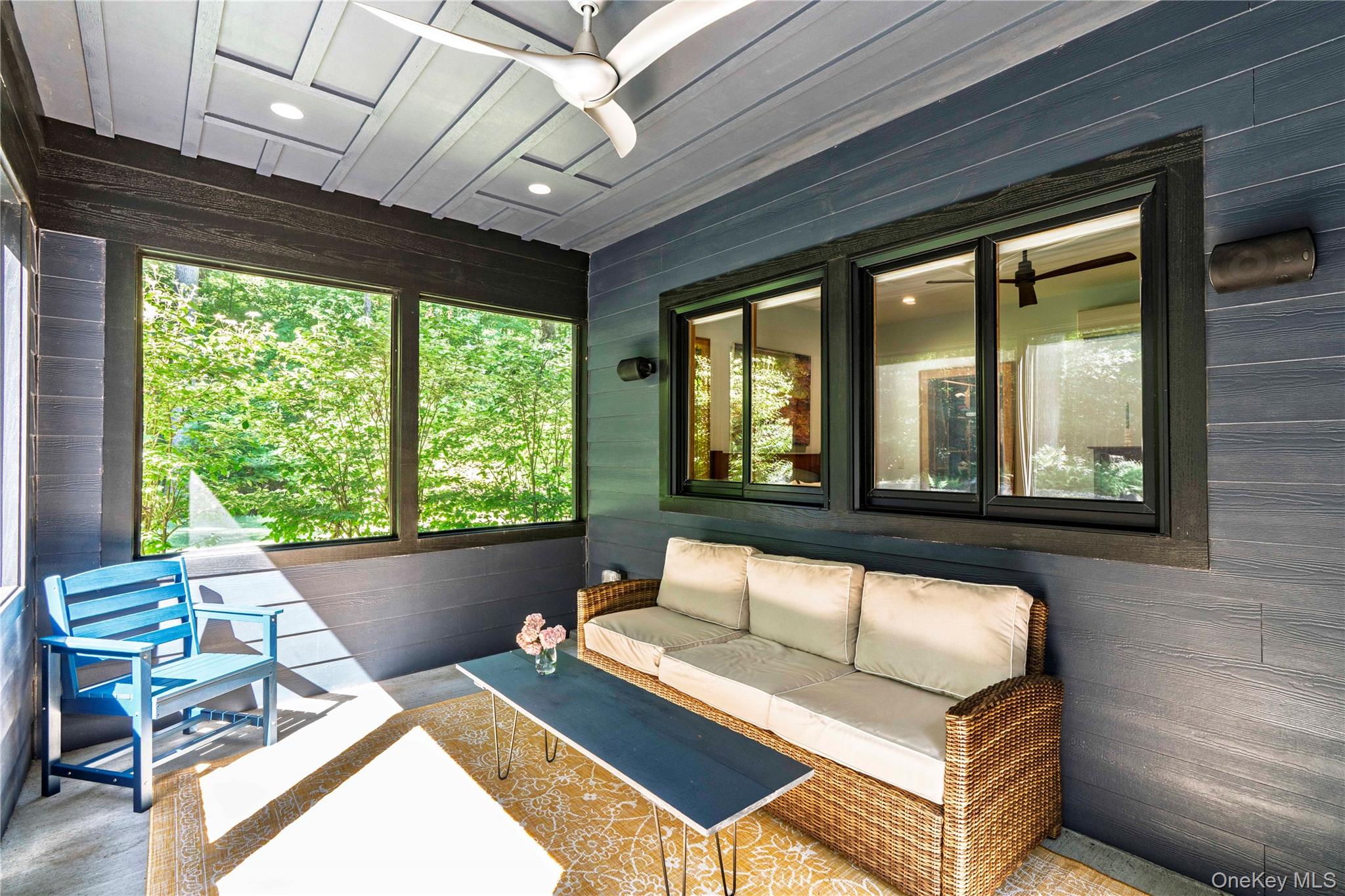 105 Iron Mountain Road Warwick, NY 10990 - Photo 36 of 49 a living room with furniture and a large window