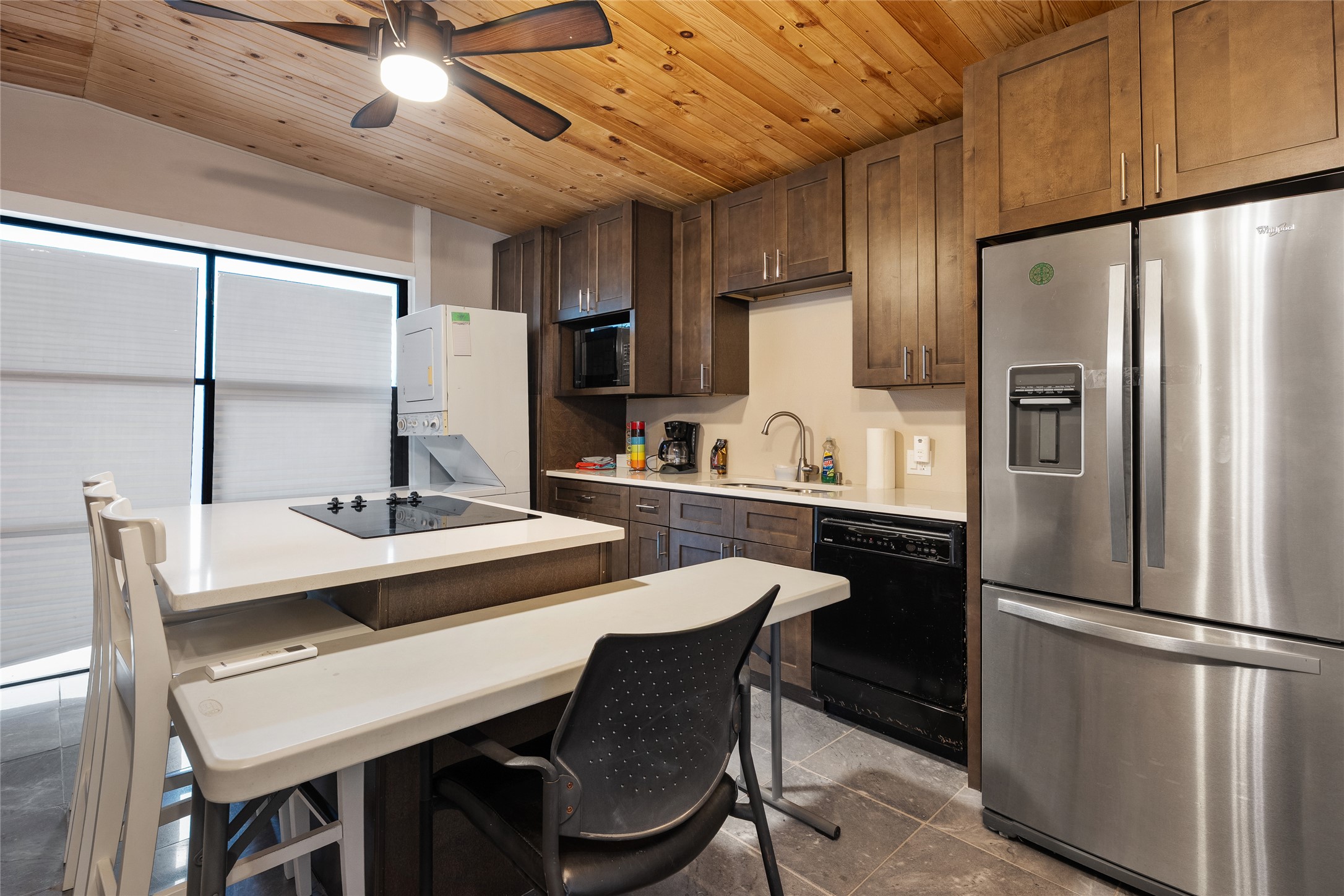 301 Oak Ridge Road Georgetown, TX 78628 - Photo 27 of 34 Kitchen featuring a wood-finish plank ceiling and a ceiling fan