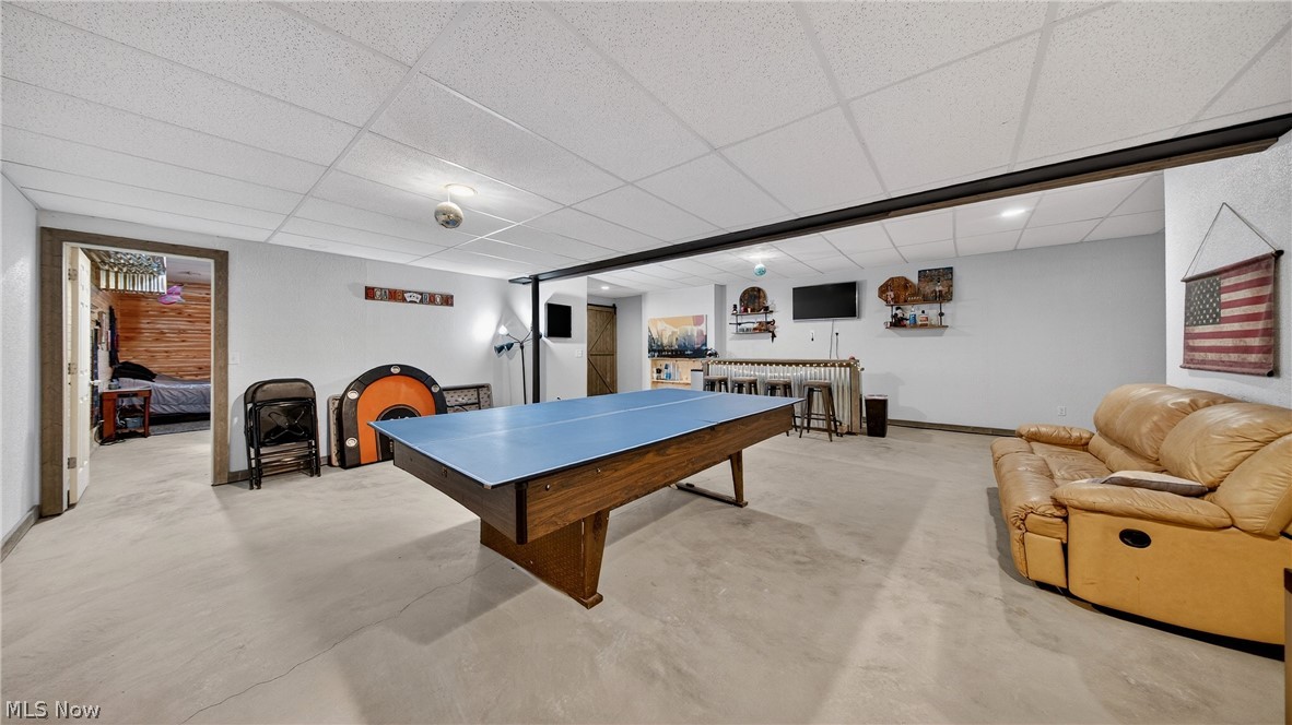 1693 Middleton Road Hudson, OH 44236 - Photo 32 of 48 Game room with a drop ceiling and finished concrete flooring