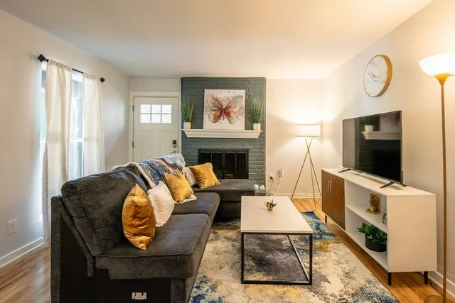 a bedroom with a bed and a couch