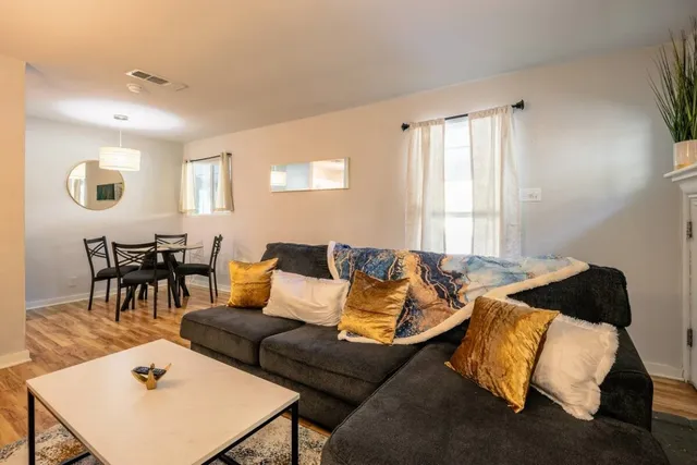 a bedroom with a bed and a table in it