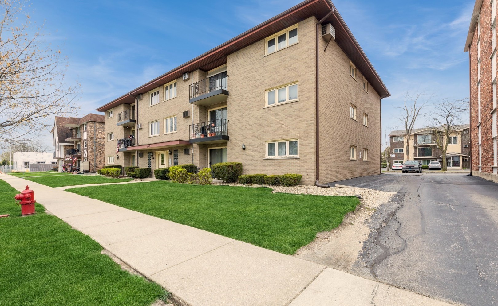 11024 Kilpatrick Avenue, Unit 3 Oak Lawn, IL 60453 - Photo 2 of 9 a view of a house with a yard
