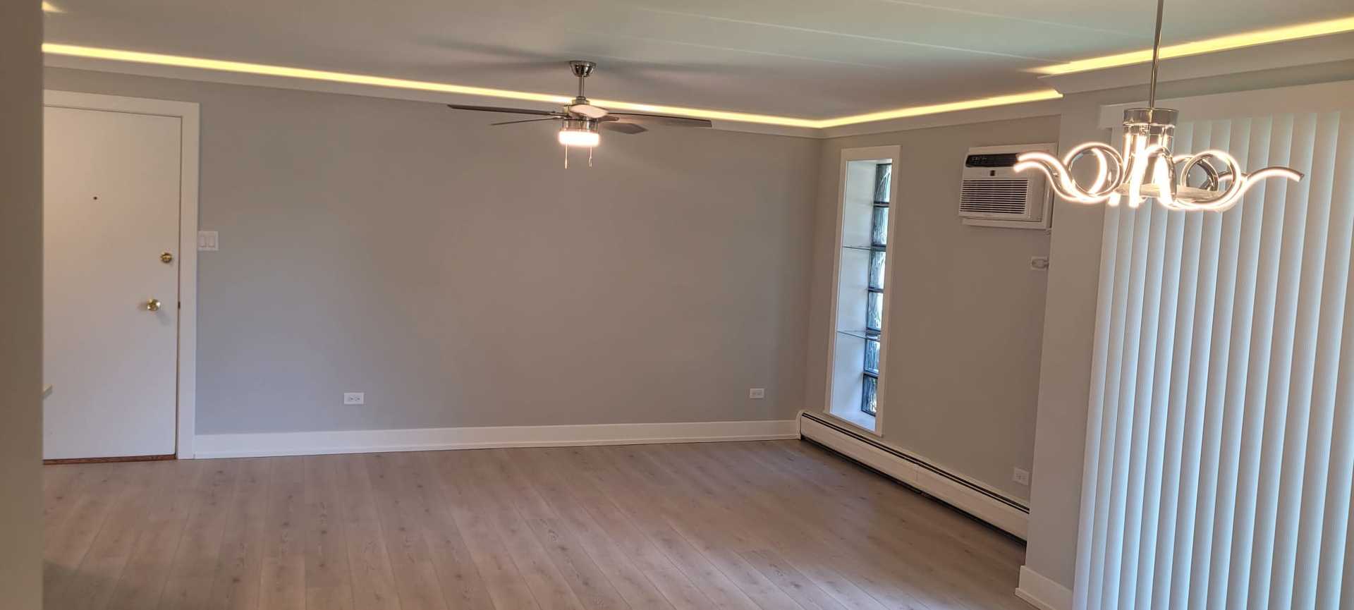 11024 Kilpatrick Avenue, Unit 3 Oak Lawn, IL 60453 - Photo 4 of 9 a view of a room with wooden floor