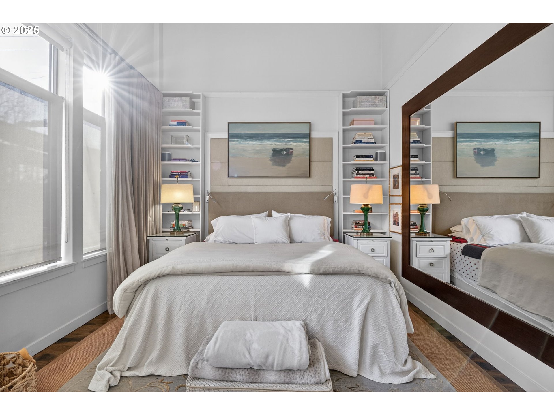 2018 Northwest 16th Avenue Portland, OR 97209 - Photo 22 of 48 a bedroom with a bed and glass window