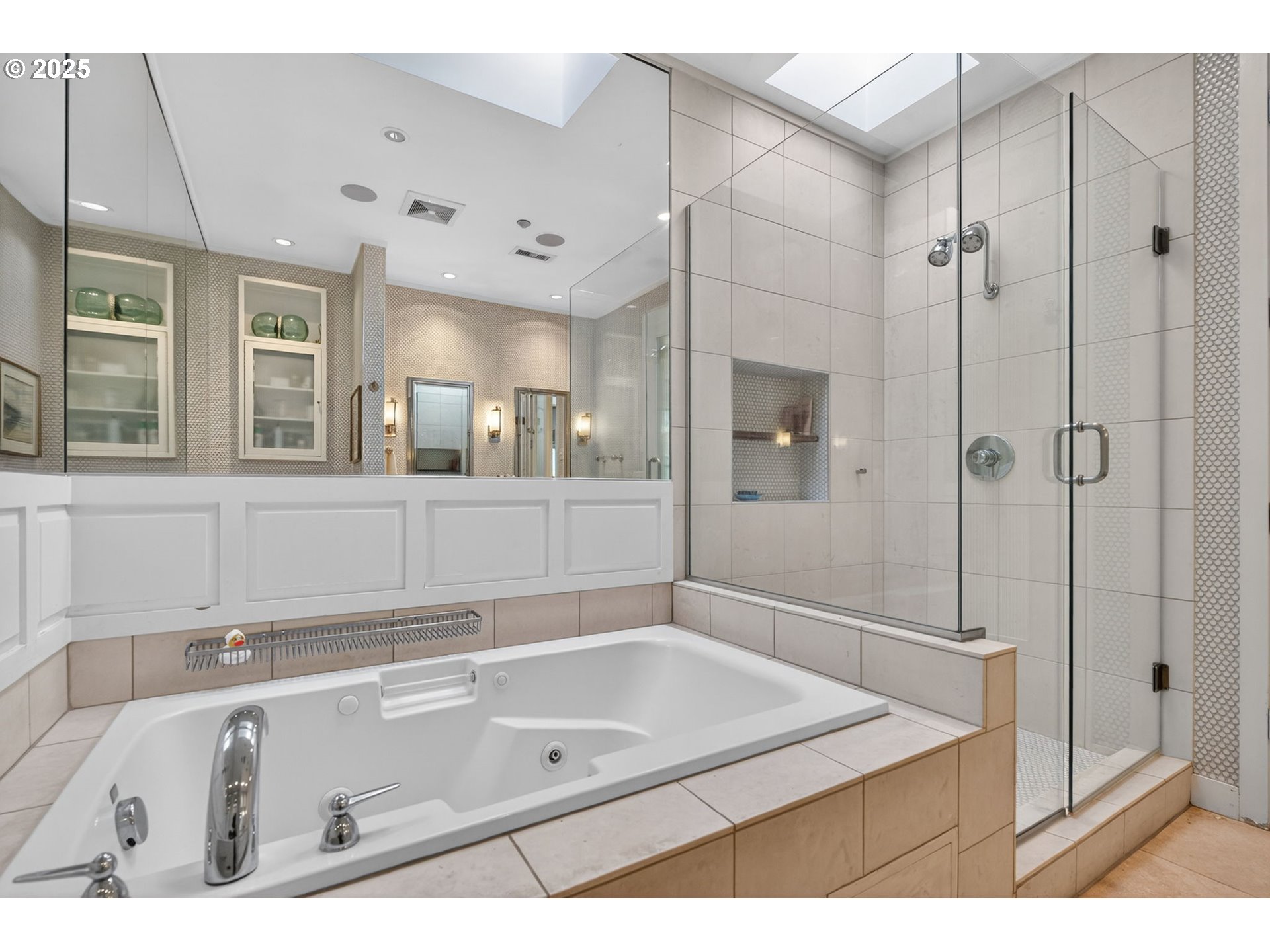 2018 Northwest 16th Avenue Portland, OR 97209 - Photo 26 of 48 a bathroom with a tub sink and mirror