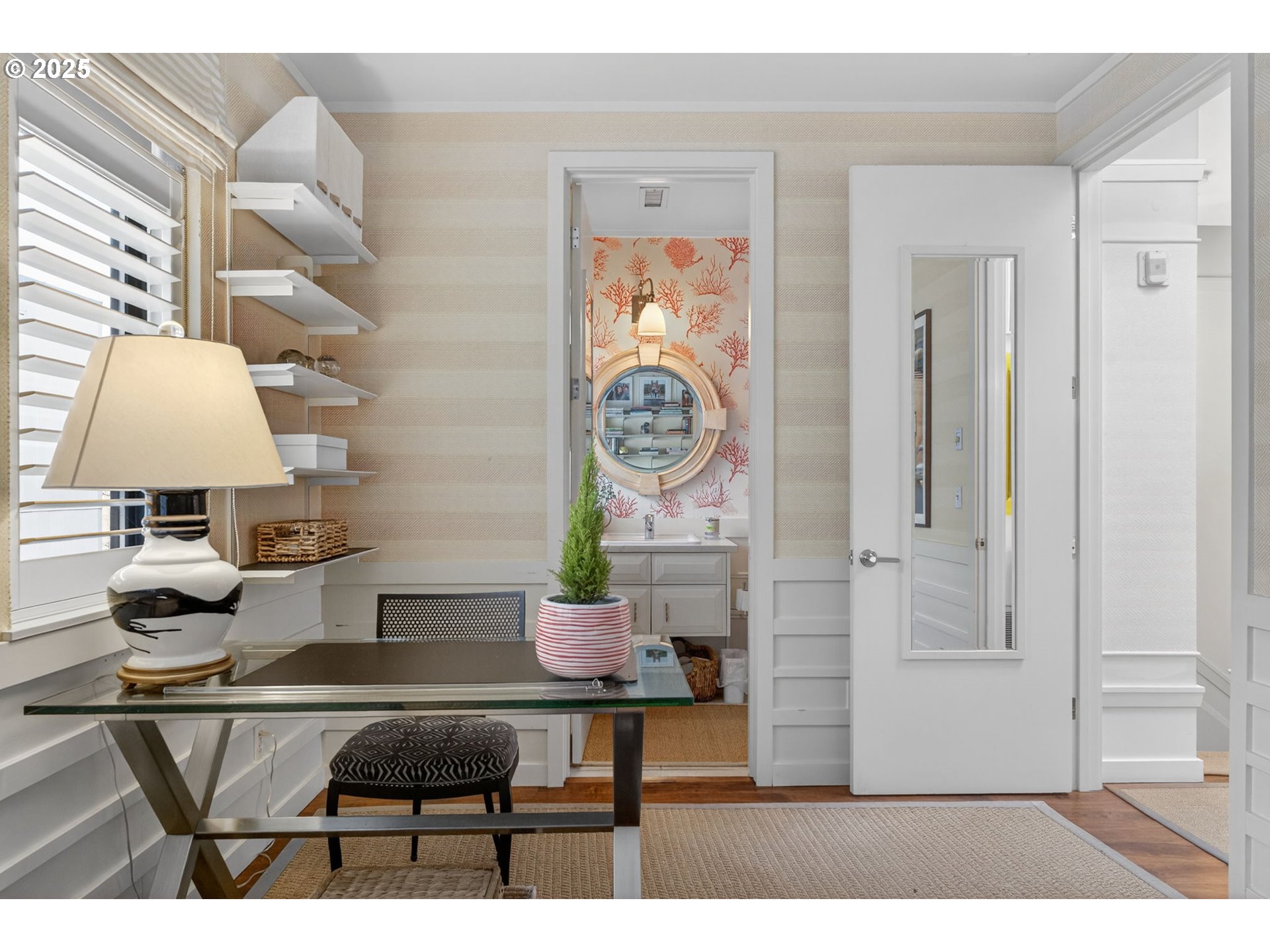 2018 Northwest 16th Avenue Portland, OR 97209 - Photo 31 of 48 a living room with a table and a chandelier