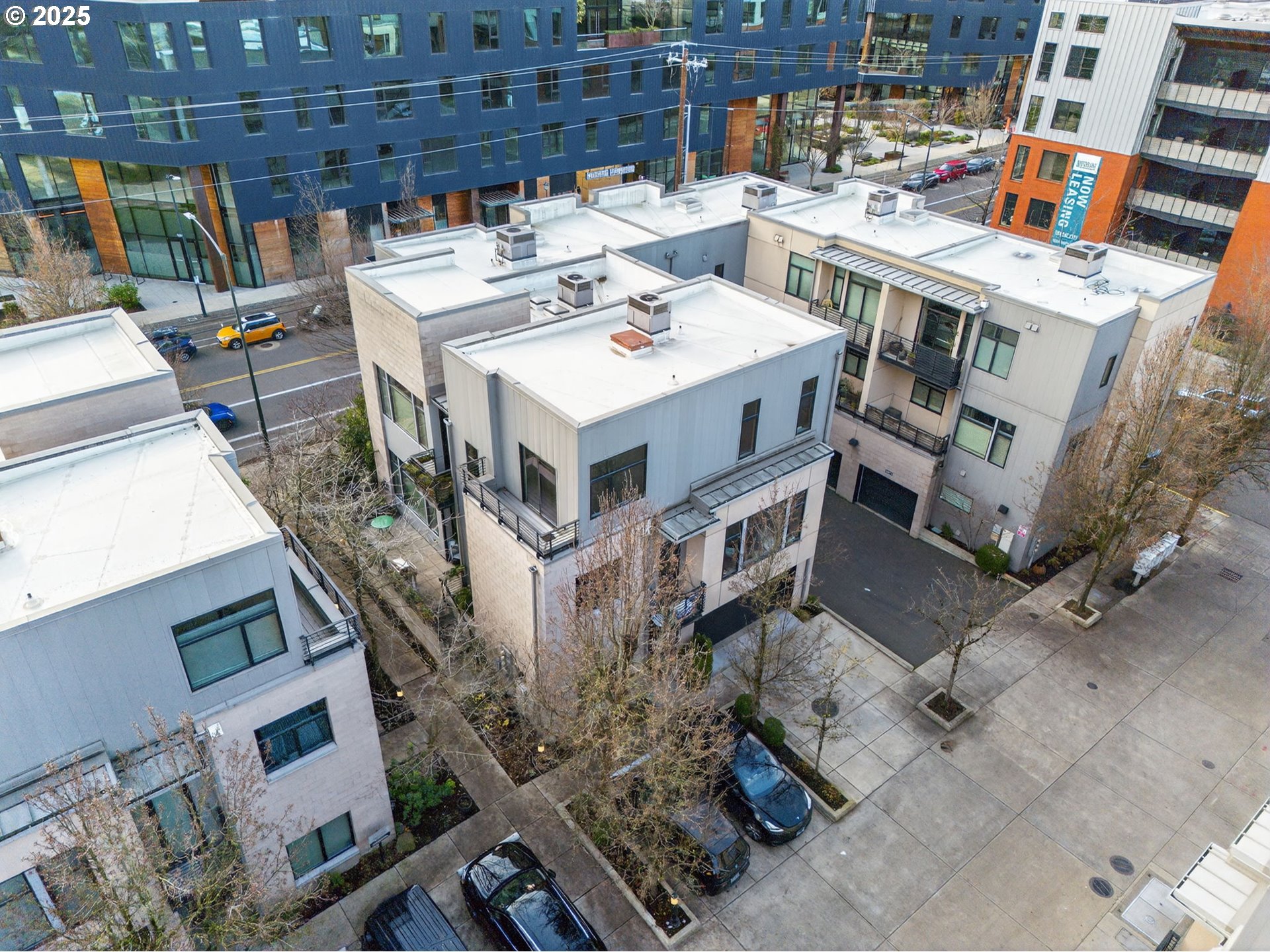 2018 Northwest 16th Avenue Portland, OR 97209 - Photo 34 of 48 a white building with a clock on the top