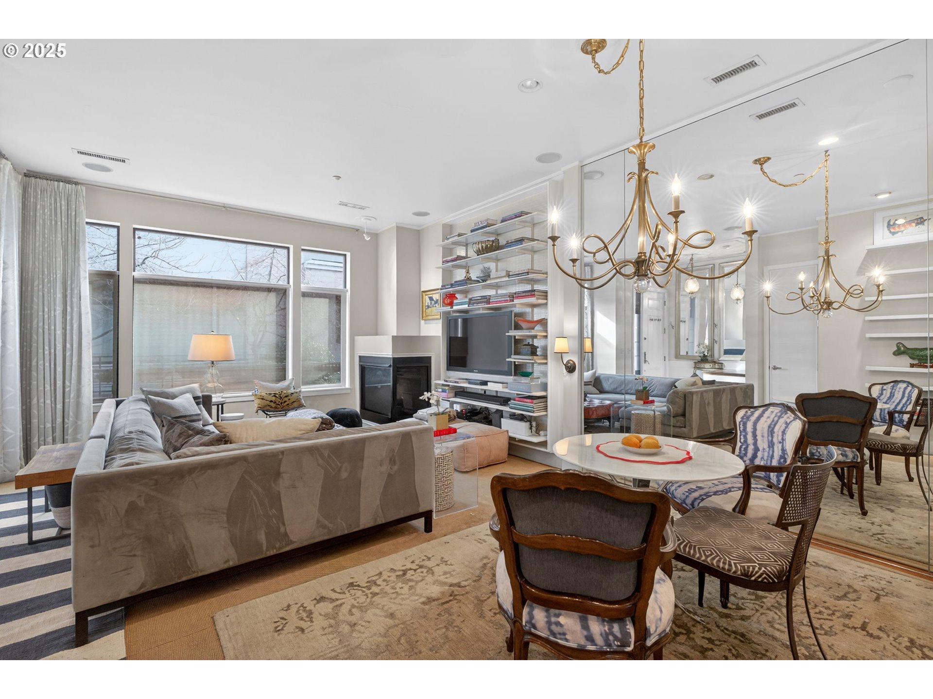 2018 Northwest 16th Avenue Portland, OR 97209 - Photo 9 of 48 a living room with lots of furniture and a chandelier
