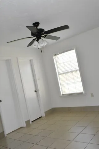 a view of a window in an empty room