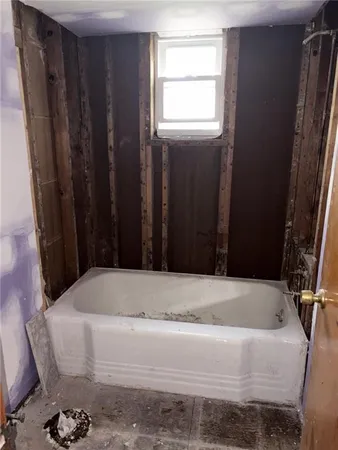 a bathroom with a bathtub