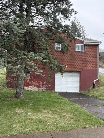front view of house with a yard