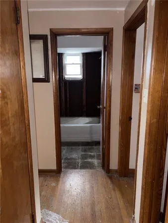 a view of front door with a hallway