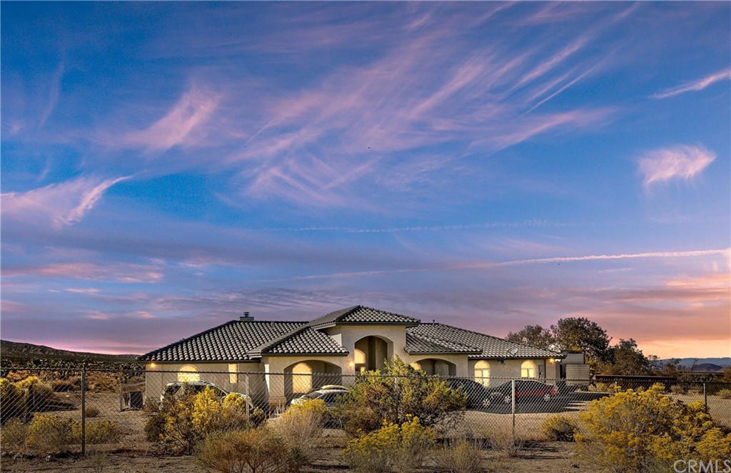 1283 Mono Road Pinon Hills, CA 92372 - Photo 1 of 1 a front view of a house with a yard