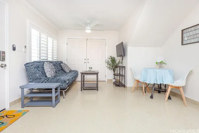 a living room with furniture and a table