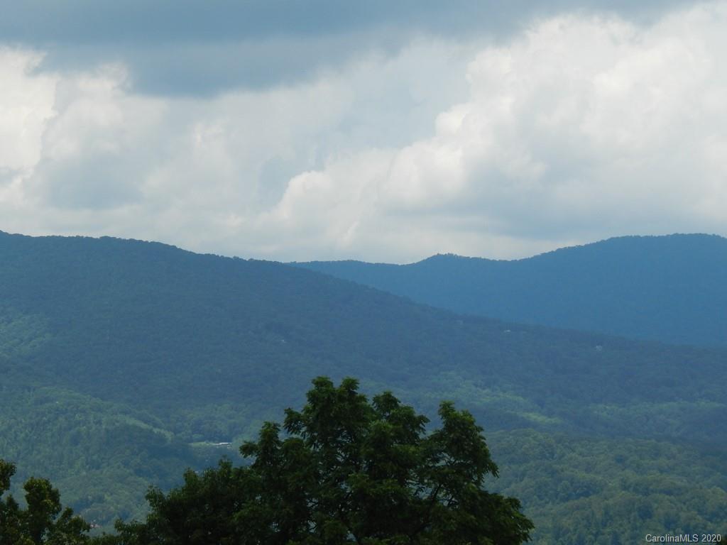0 Saunook Road Waynesville, NC 28786 - Photo 11 of 11 a view of mountain with sunset in background