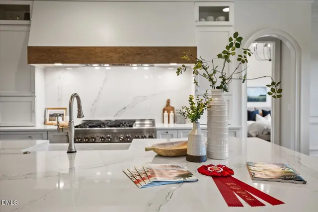a bedroom with a bed and cabinets