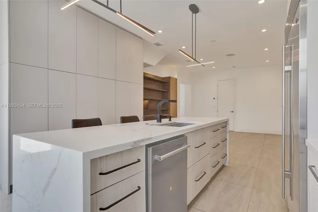 a bathroom with a toilet a sink and a mirror