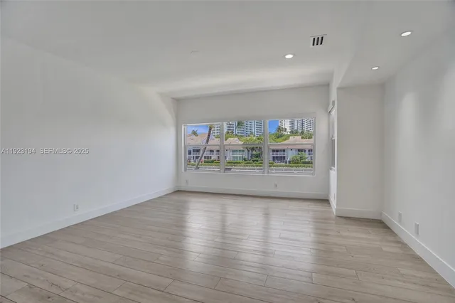 a bathroom with a sink a toilet and bathtub
