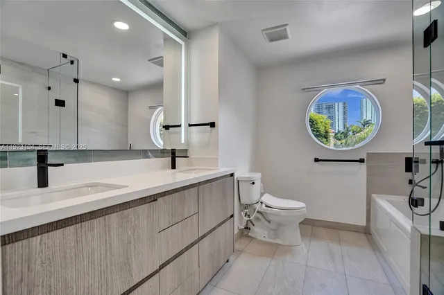 a view of a swimming pool with a lawn chair and palm trees