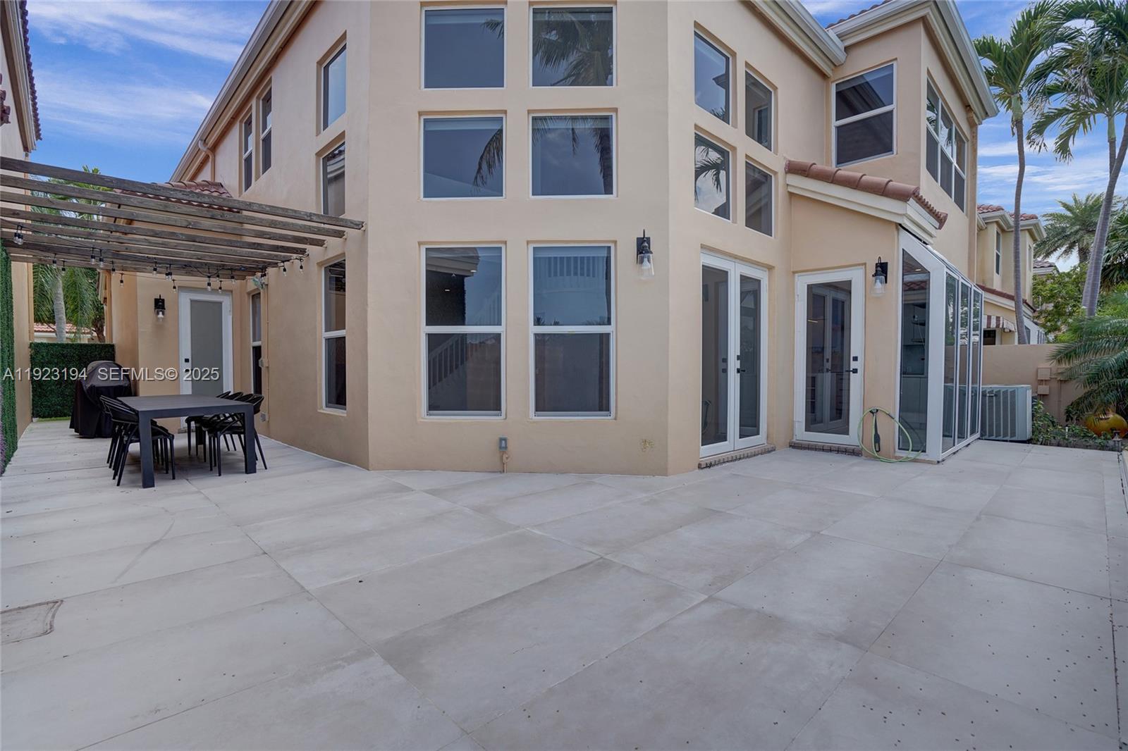 3757 Northeast 208th Terrace Aventura, FL 33180 - Photo 47 of 74 a view of a building with sitting area