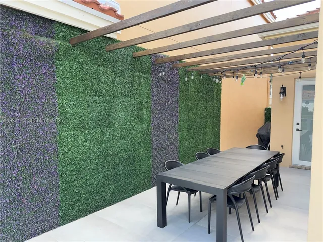 an aerial view of a house with a ocean view