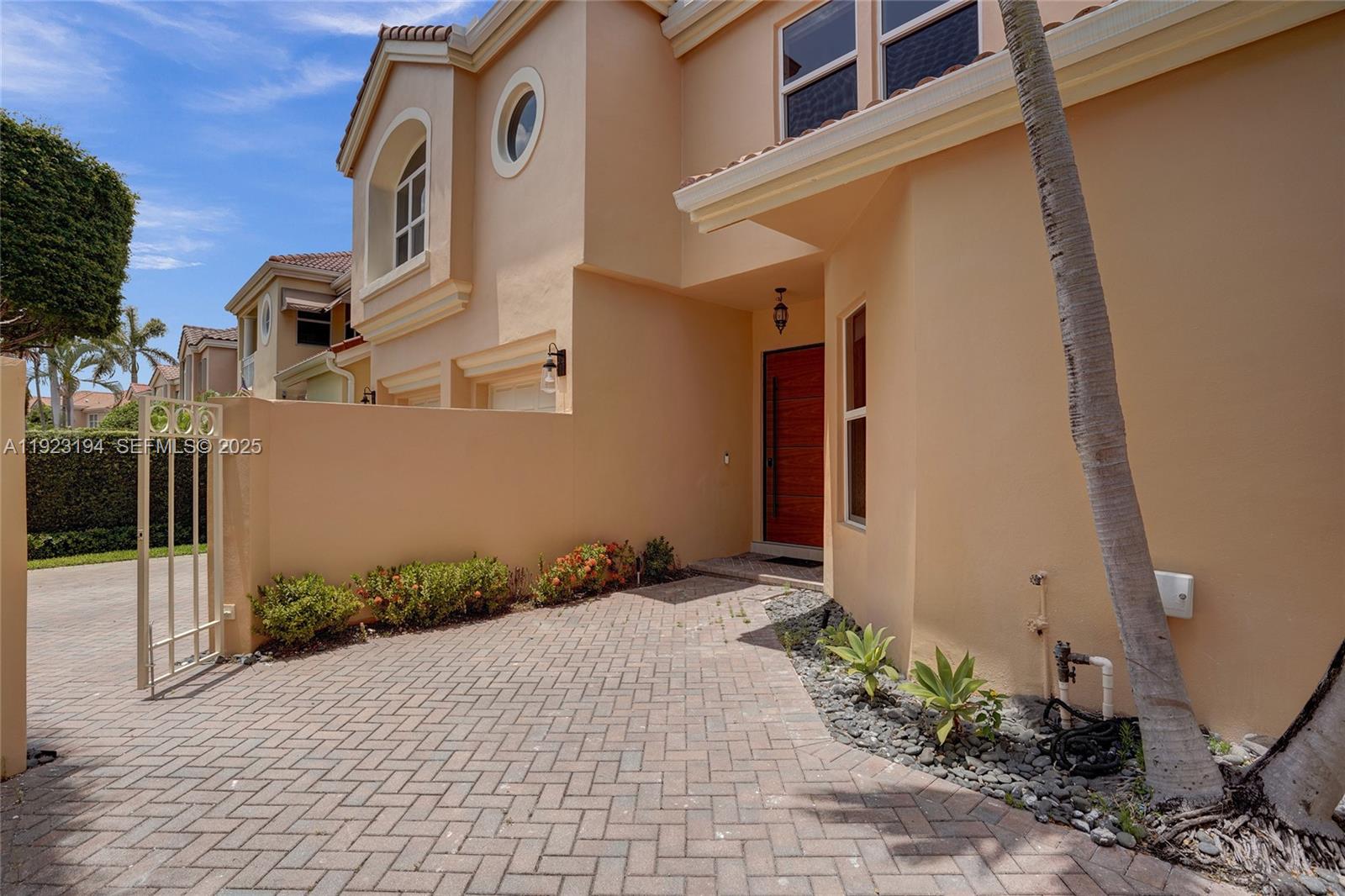 3757 Northeast 208th Terrace Aventura, FL 33180 - Photo 58 of 74 a front view of a house