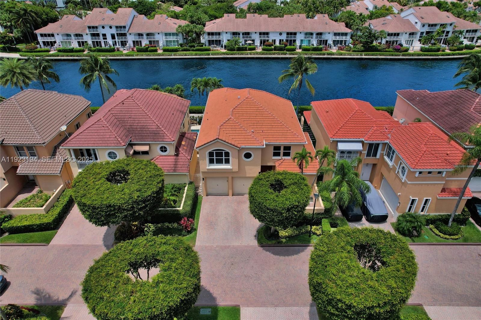 3757 Northeast 208th Terrace Aventura, FL 33180 - Photo 62 of 74 an aerial view of house with yard and lake view