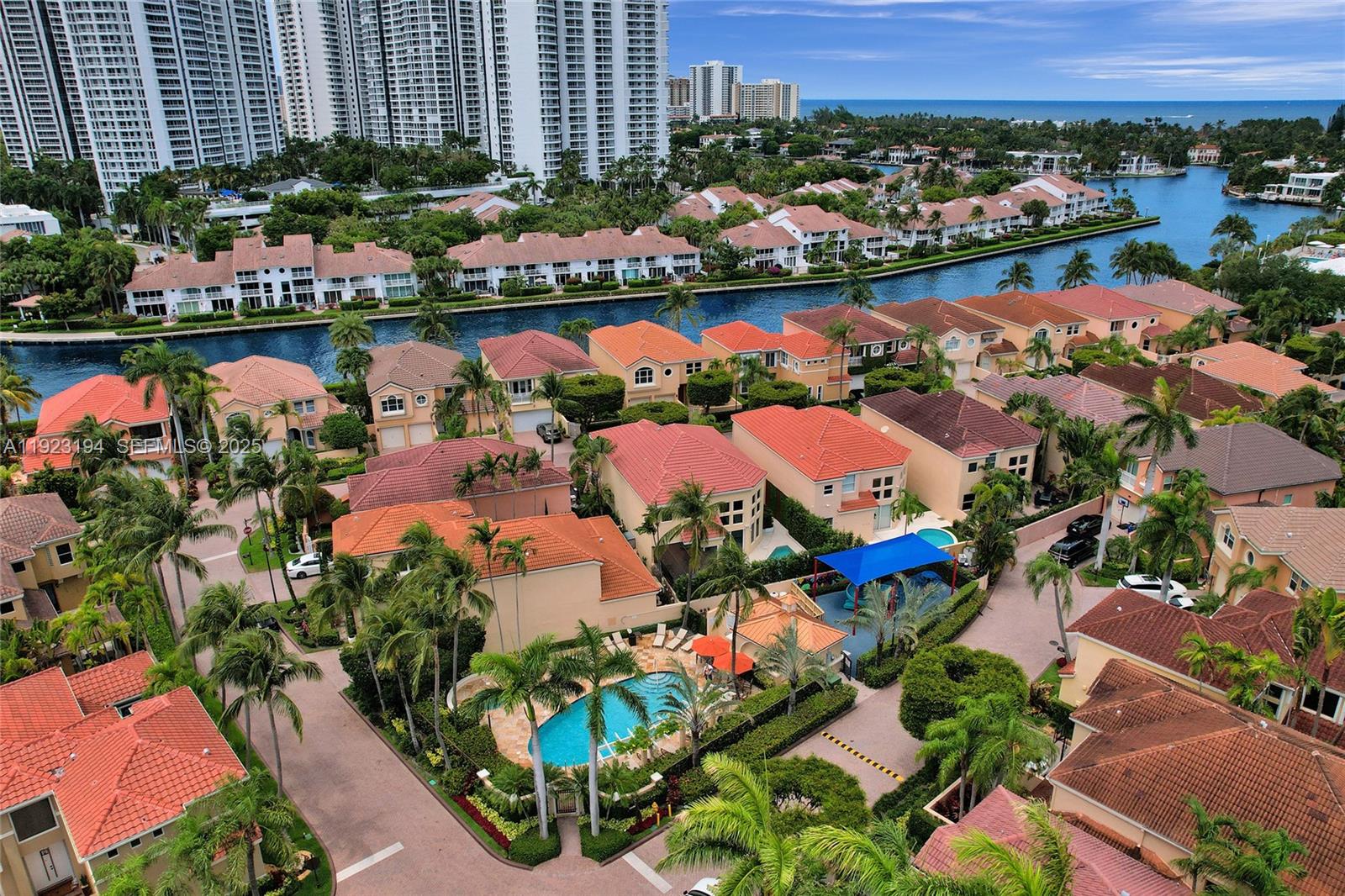 3757 Northeast 208th Terrace Aventura, FL 33180 - Photo 74 of 74 an aerial view of a houses and an outdoor space