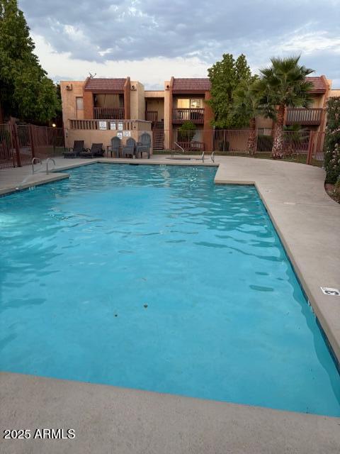 2121 West Royal Palm Road, Unit 2074 Phoenix, AZ 85021 - Photo 19 of 22 a view of a house with backyard porch and sitting area