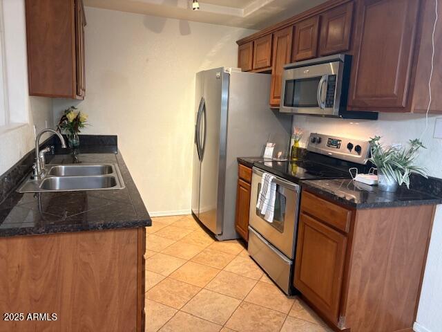 2121 West Royal Palm Road, Unit 2074 Phoenix, AZ 85021 - Photo 3 of 22 a kitchen with stainless steel appliances granite countertop a refrigerator a stove a sink and dishwasher