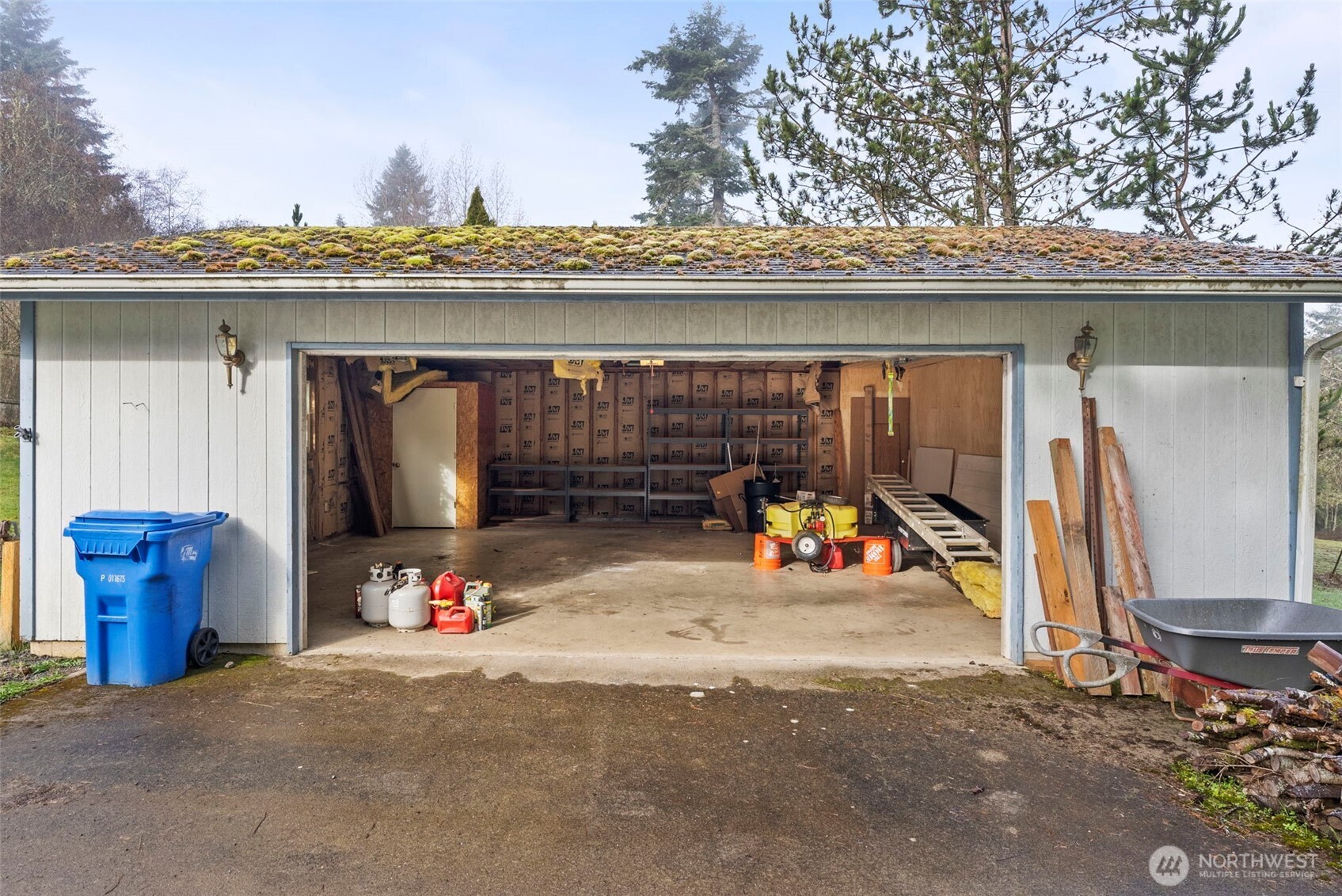 104 Sun Valley Drive Chehalis, WA 98532 - Photo 20 of 29 a view of a garage with parked cars