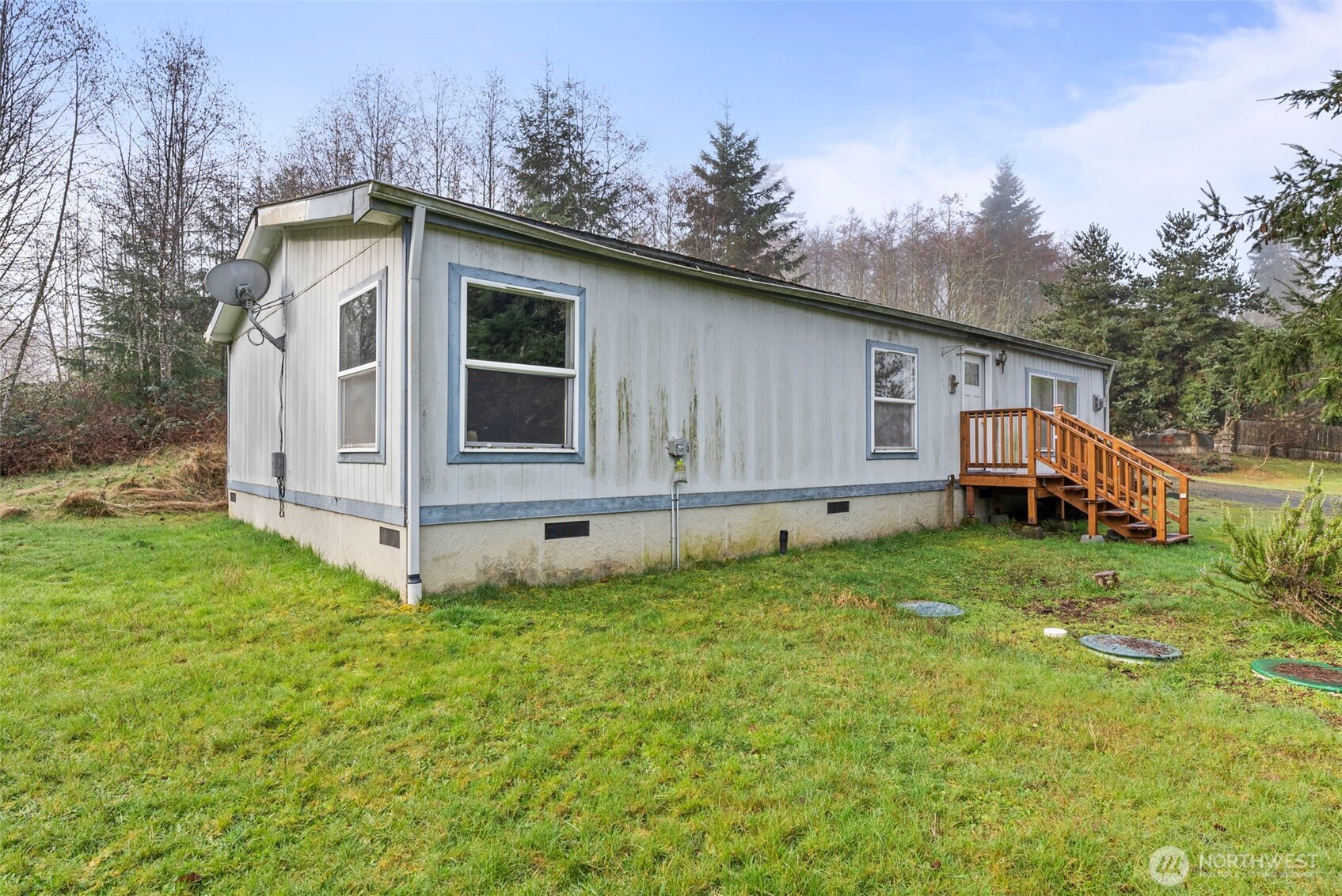 104 Sun Valley Drive Chehalis, WA 98532 - Photo 22 of 29 a house with trees in the background