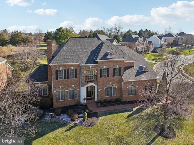 an aerial view of a house with garden