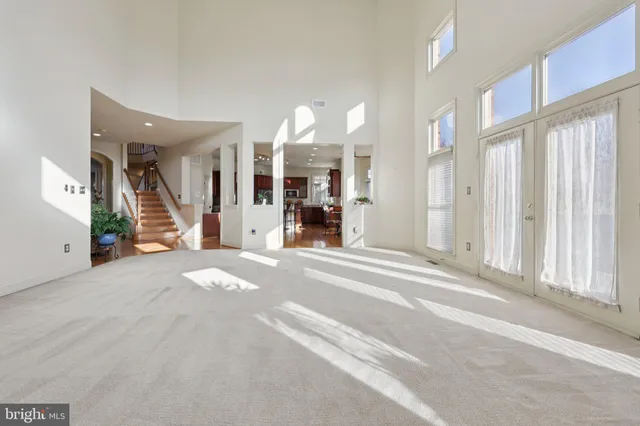 a bathroom with a sink a toilet and shower curtain