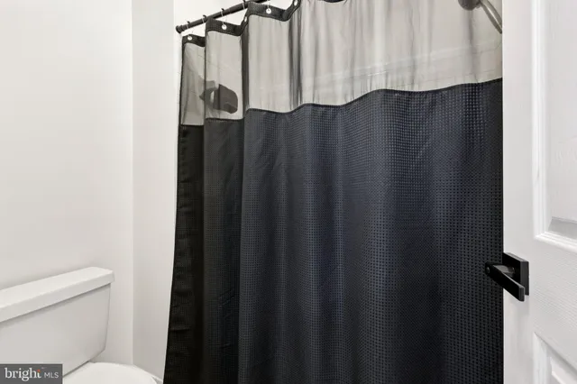 an aerial view of a city with lots of residential buildings