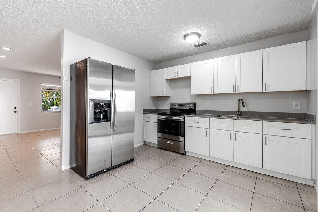 4468 Stevens Road Lake Worth, FL 33461 - Photo 6 of 25 4468StevensRoad,LakeWorth-3