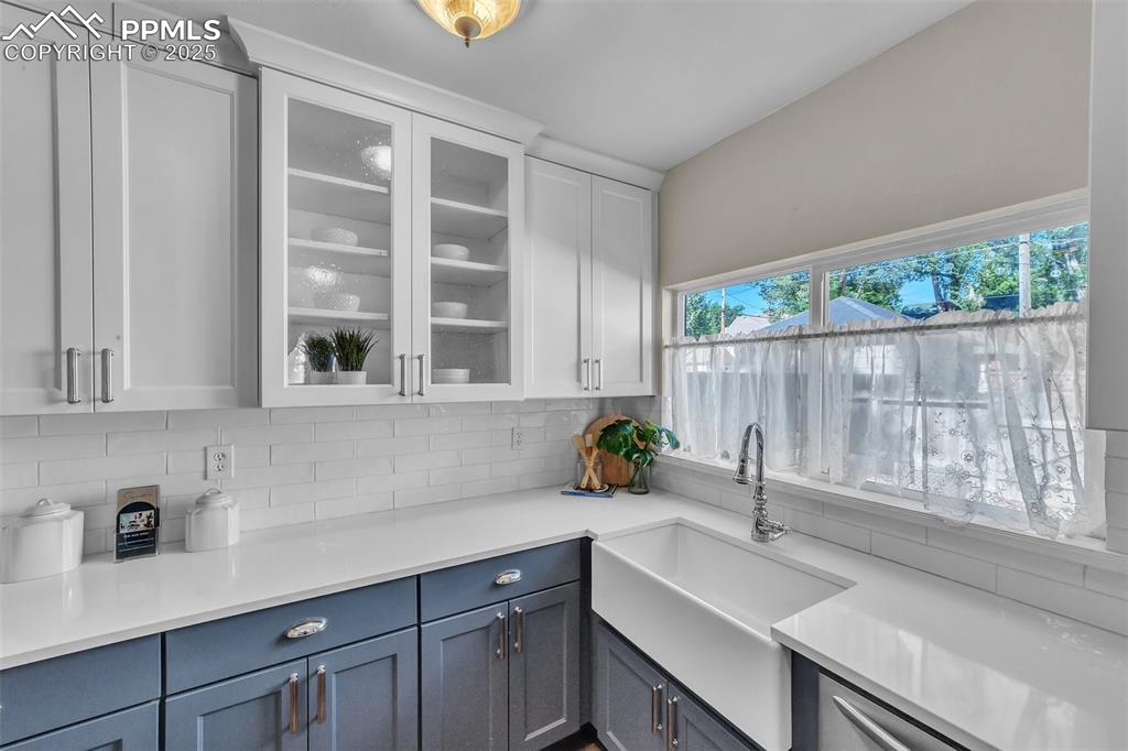 319 South Institute Street Colorado Springs, CO 80903 - Photo 12 of 49 a kitchen with a sink and a large window