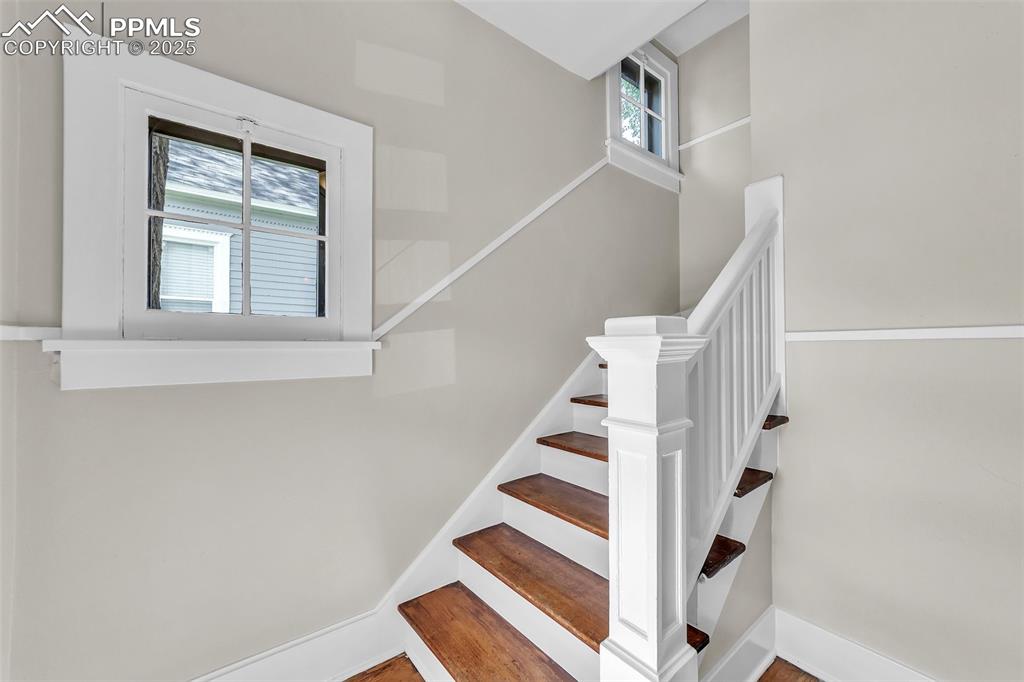 319 South Institute Street Colorado Springs, CO 80903 - Photo 16 of 49 a view of entryway and hall with wooden floor